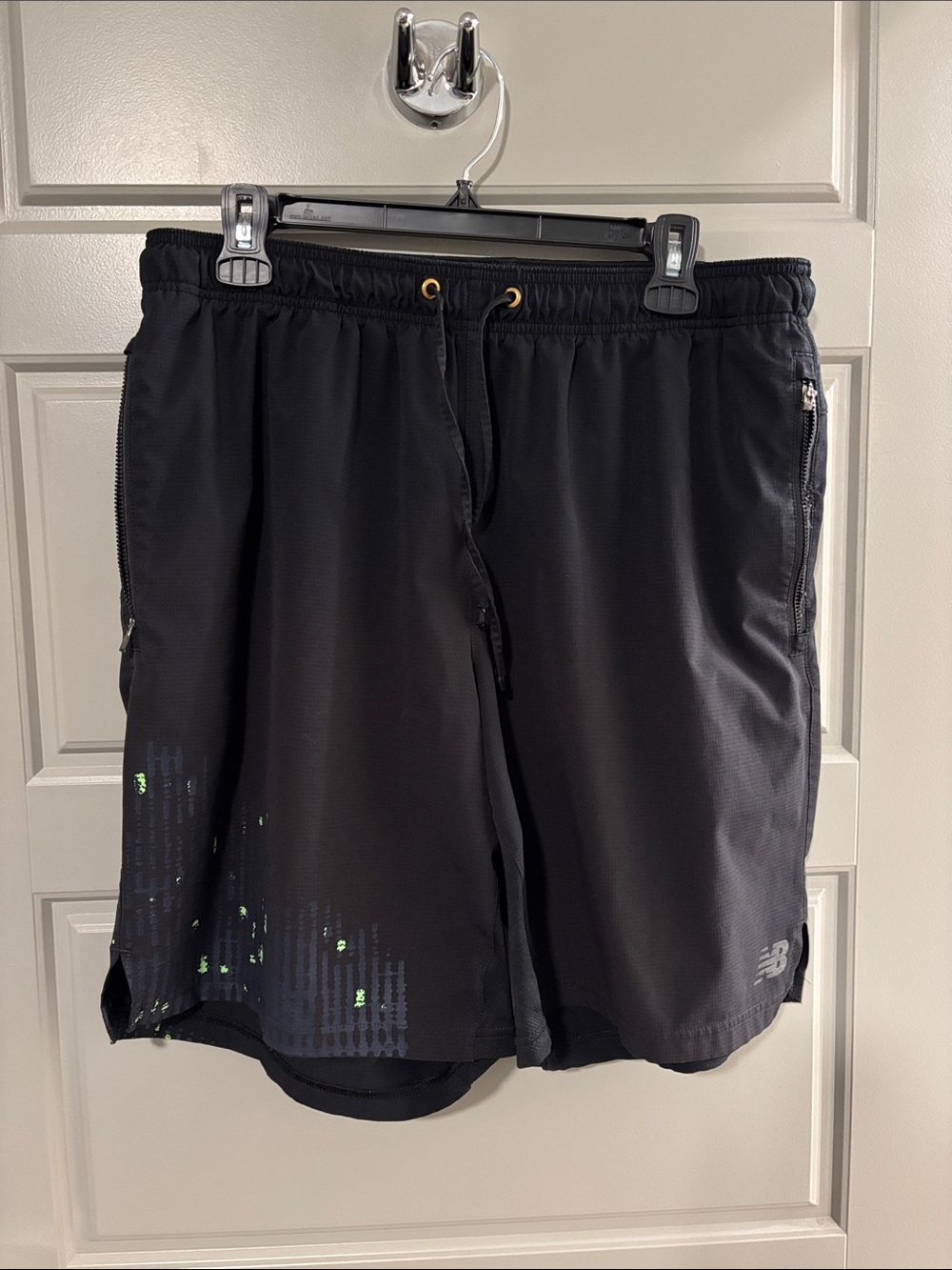 New Balance Black Athletic Shorts with Green Pixel Accent